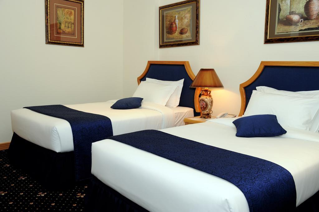 Cayam Hotel Doha Phòng bức ảnh